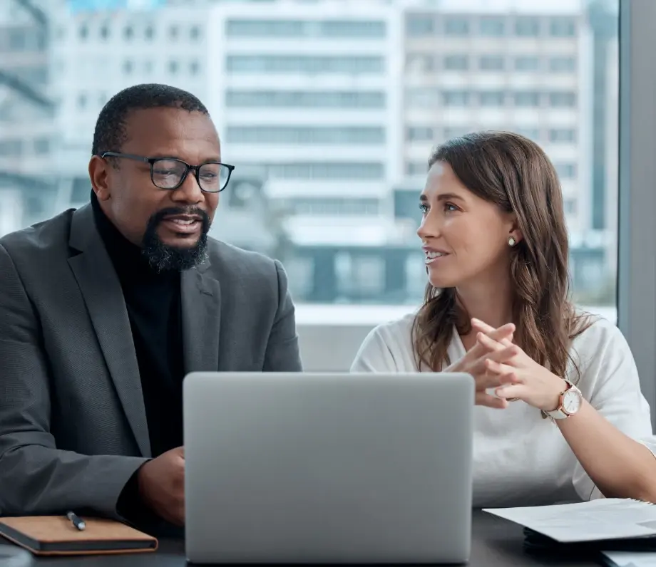 Man and woman at a laptop