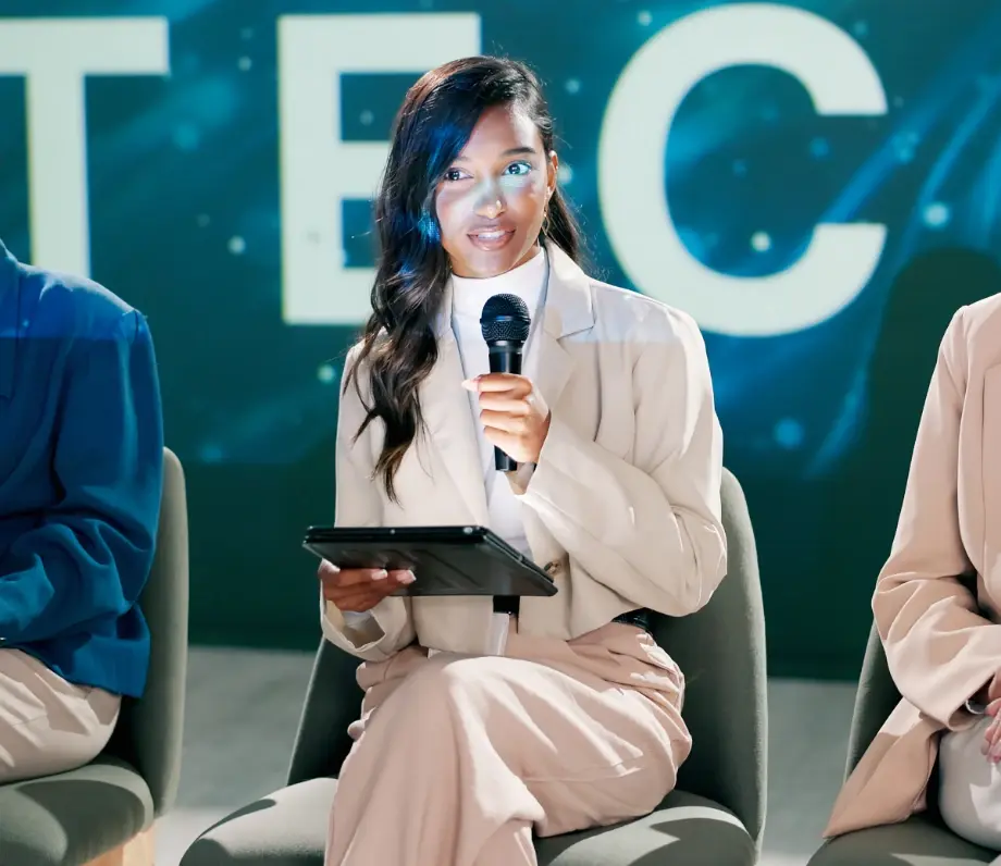 Woman with microphone and notes